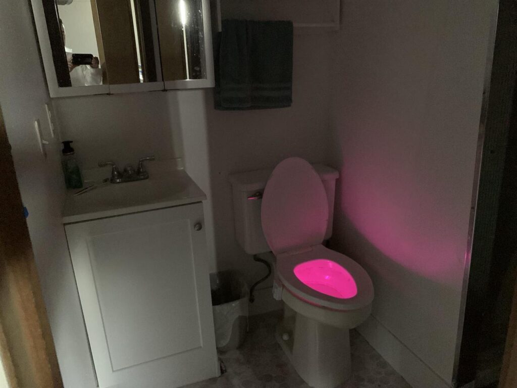 Glowing toilet in the basement of 1208 Bowen Ct.